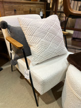 Soft pale contemporary armchair.