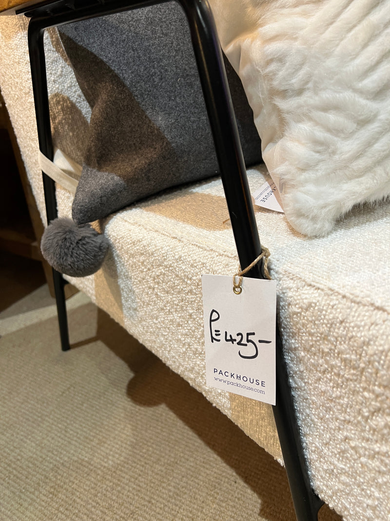 Soft pale contemporary armchair.